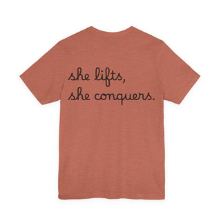She Lifts, She Conquers Weightlifting Tee — Motivational Women’s Gym T-Shirt
