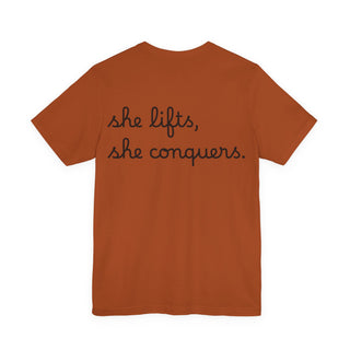 She Lifts, She Conquers Weightlifting Tee — Motivational Women’s Gym T-Shirt