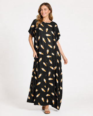 Black kaftan dress with gold leaf shapes