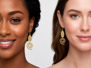 Gold filigree textured leaf shaped elegant earrings with a swirling spiral pendant