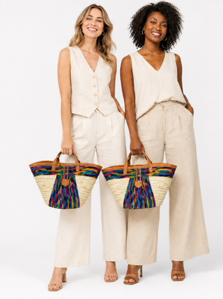 Woven straw Kiondoo basket featuring a red fabric band with a bold pattern and orange accents (Copy)