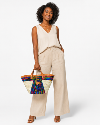 Woven straw Kiondoo basket featuring a red fabric band with a bold pattern and orange accents (Copy)