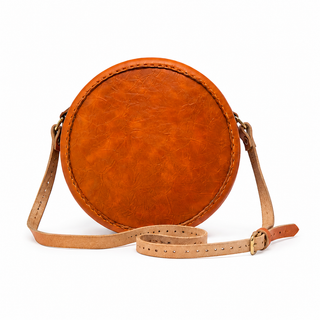 Round orange and black woven handbag with sequins